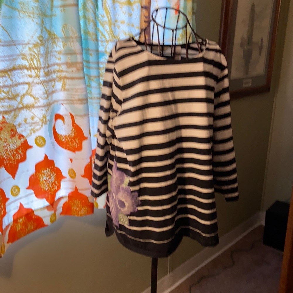 Black and white striped top with purple flower
